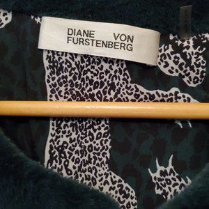 DVF L Green faux fur vest with pockets hook and eye closure and panther lining